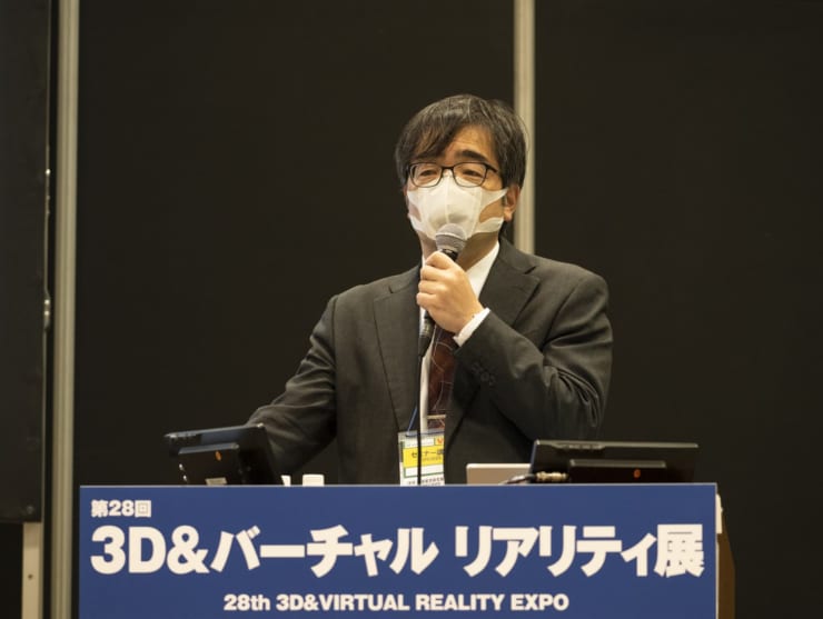 JAXAセキュリティ・情報化推進部の藤田直行氏。新型コロナウイルス感染対策のため、マスクを付けての登壇となった