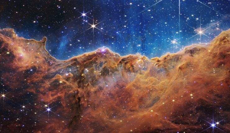 カリーナ星雲の「宇宙の断崖」（NIRCam画像）