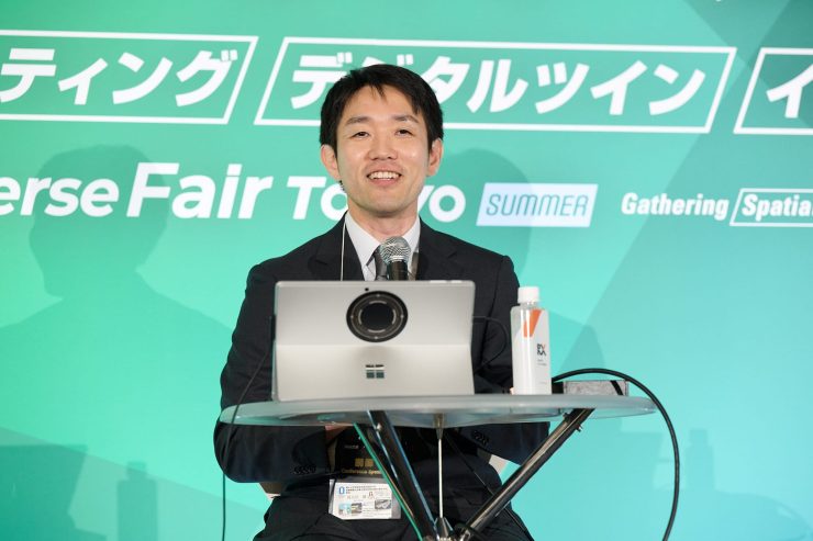登壇中の長谷井氏