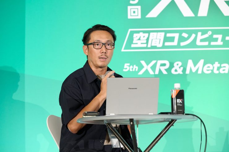登壇中の宮崎氏