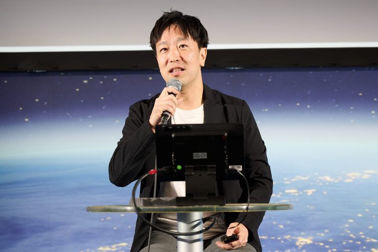 登壇中の中村氏