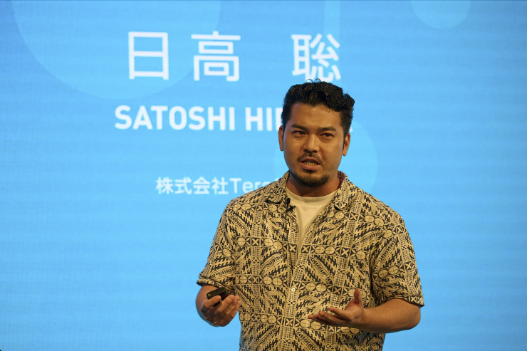 登壇中の日高氏
