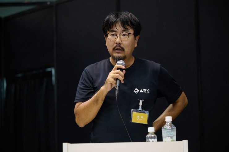 登壇中の竹之下氏