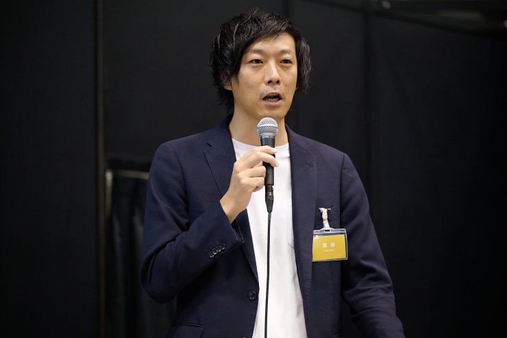 登壇中の橘高氏