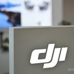 中国のハイテク機器メーカー、大疆創新科技（DJI）のロゴ（2019年5月27日撮影）。(c)HECTOR RETAMAL:AFP